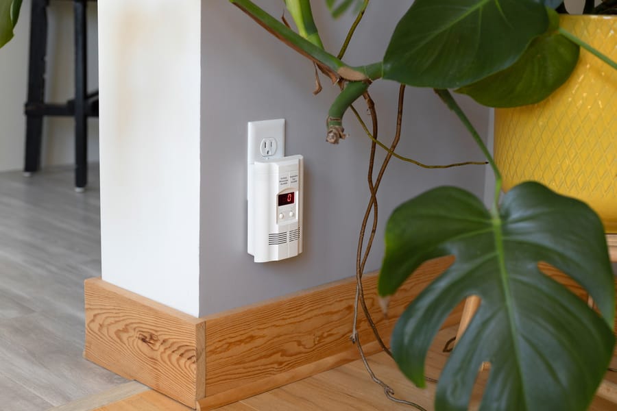 Carbon monoxide alarm on wall.